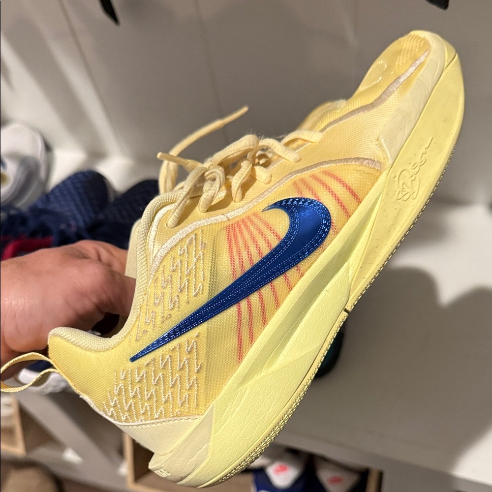 Nike Yellow Sneakers with Blue Swoosh